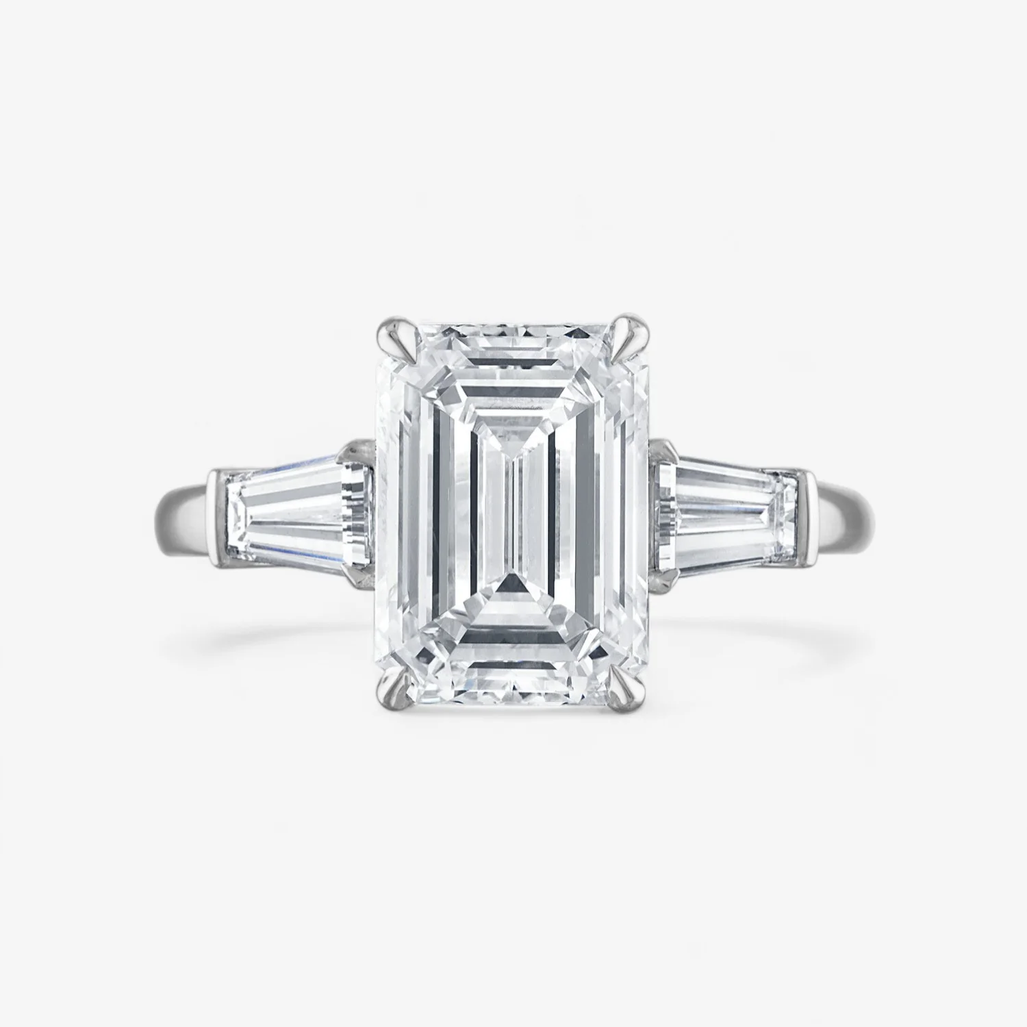 Emerald Cut Three-Stone with with Tapered Baguette Side Stones Engagement Ring