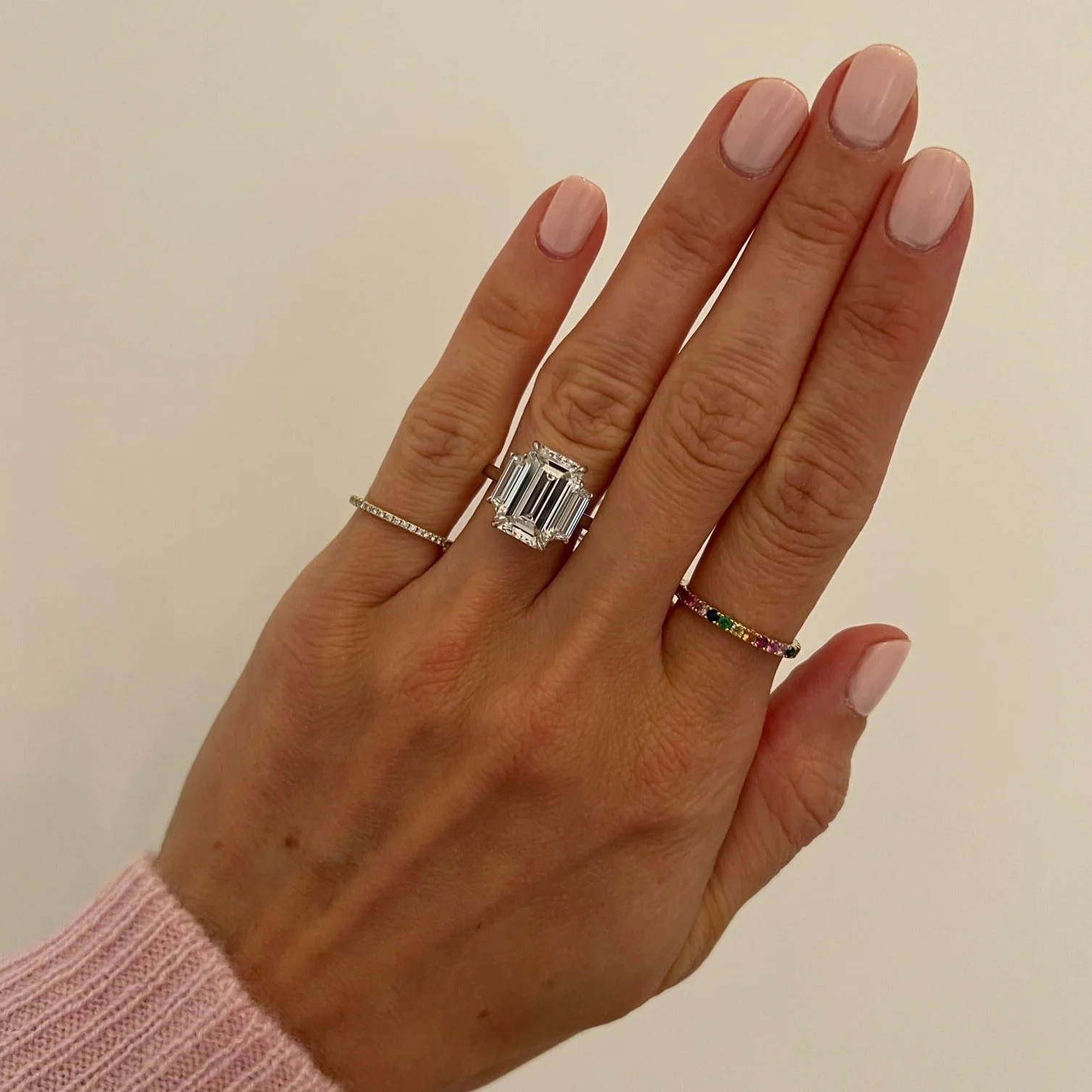Emerald Cut Three-Stone with Trapezoid Side Stones Engagement Ring - Image 3