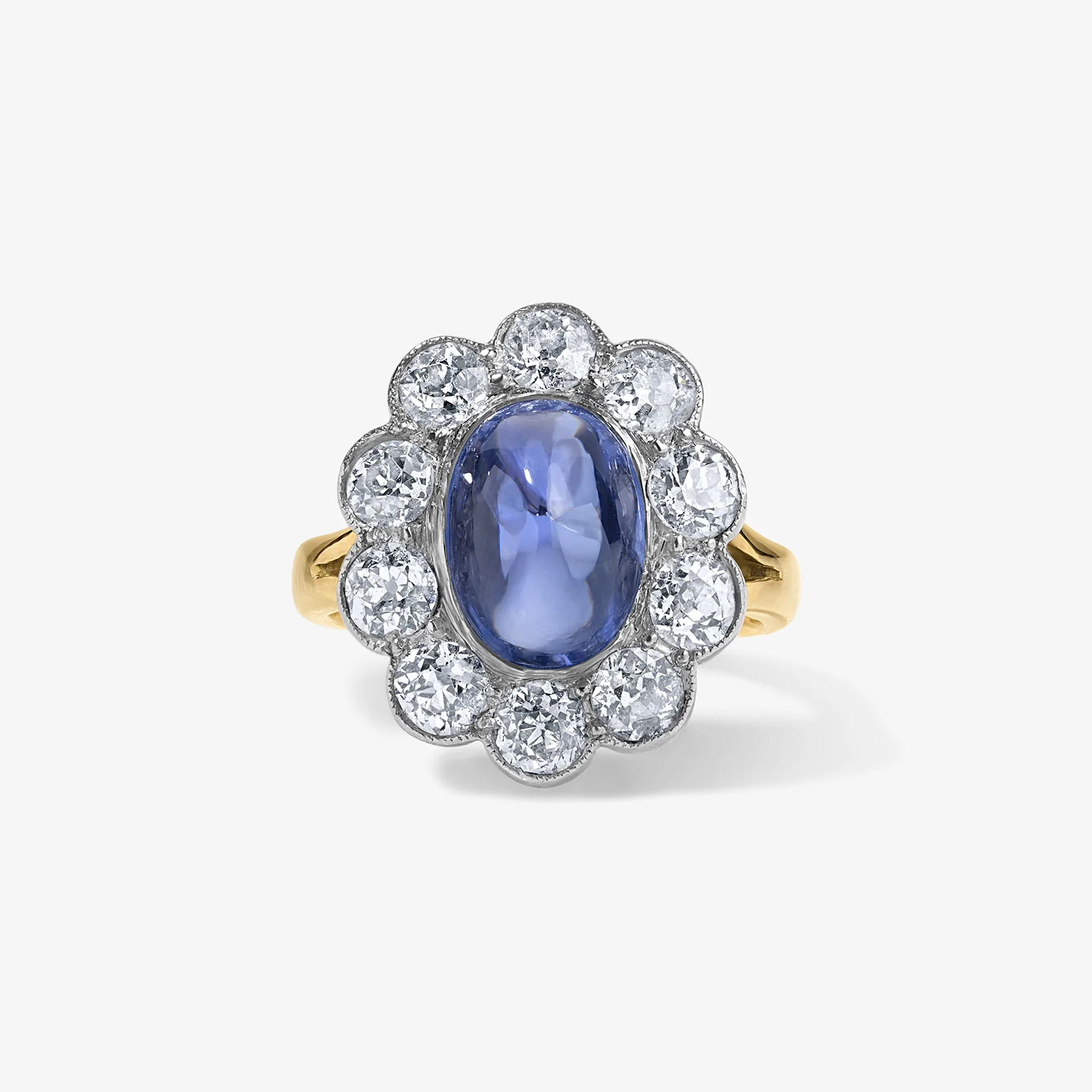 Cabochon Sapphire Ring with Old Mind Cut Diamond Halo